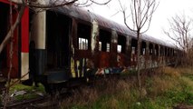 Thessaloniki Greece snow rail 17 February 2015. On my way to work, I pass from these abandoned train wagons, at Thessaloniki's west entrance. It rarely snows in the city. (See more at https://www.youtube.com/channel/UCpNQHHM3xG8Uc55C-OOcx7Q)