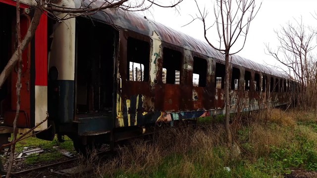 Thessaloniki Greece snow rail 17 February 2015. On my way to work, I pass from these abandoned train wagons, at Thessaloniki's west entrance. It rarely snows in the city. (See more at youtube.com/channel/UCpNQHHM3xG8Uc55C-OOcx7Q)