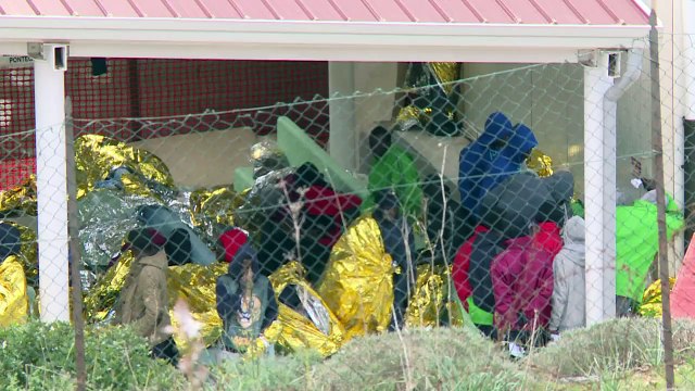 Tiny Italian island struggles to cope with tide of migrants