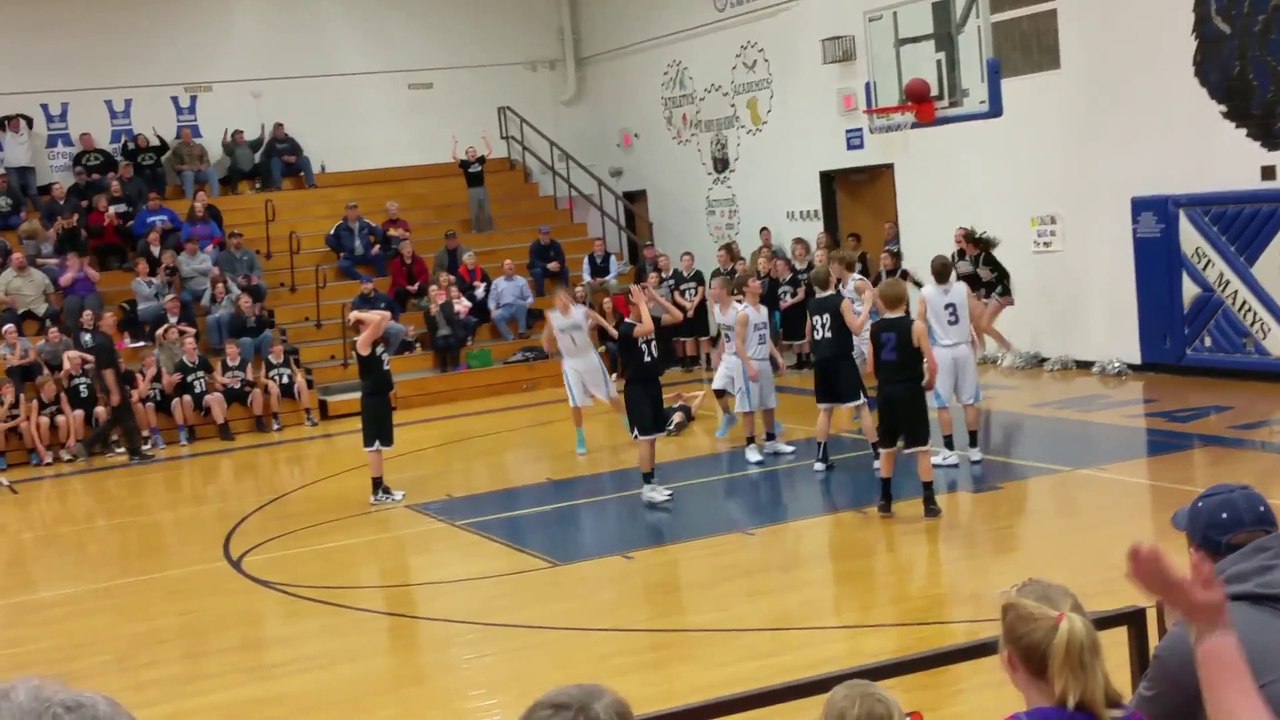Basketball stuck on rim in final seconds of game : life is not fair!
