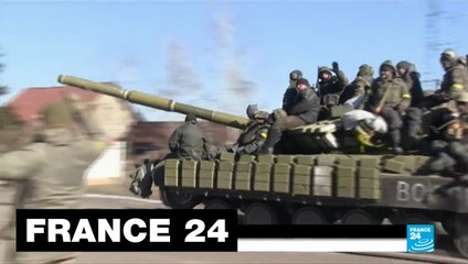 UKRAINE - Soldiers from national forces escape by the skin of their teeth