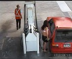 Lady goes flying as driver pulls away with hose still in Gas tank