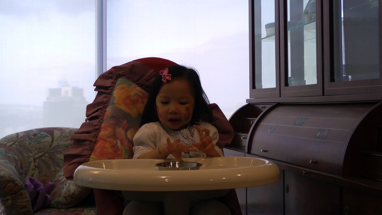 Girl Eating Vegetable