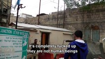 Hebron: Palestinian kids throwing stones at soldiers