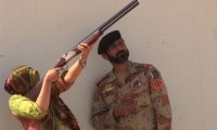 Karachi female students getting training of using guns