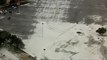 Driver does donuts in Plano mall parking lot during Winter Storm