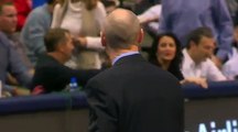 Coach Rick Carlisle exchanges words with Rajon Rondo