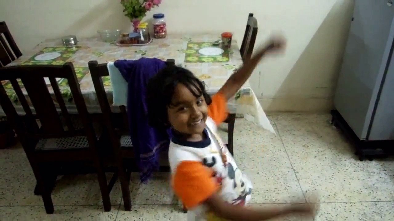 Mother Cooking & Daughter Dancing