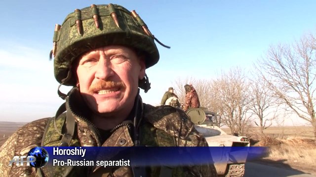 Pro-Russian rebels demonstrate arms pull-back in Ukraine