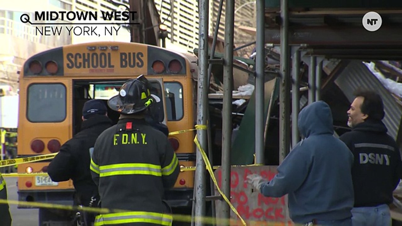 Manhattan Building Collapses Near School Busses, Injures One