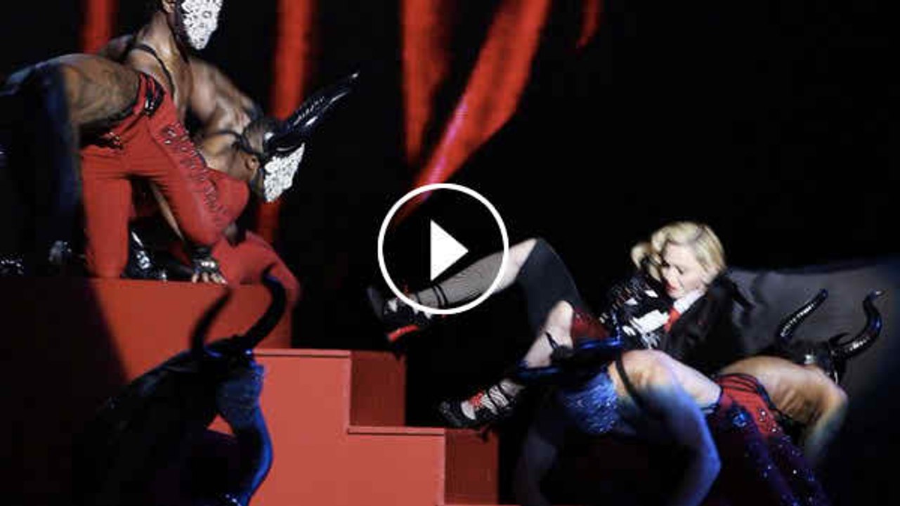 WATCH Madonna Falls Off Stage at Brit Awards Video