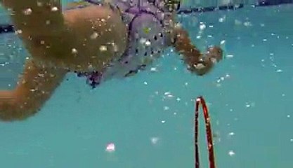 2-Year-Old Swims Through Hoops