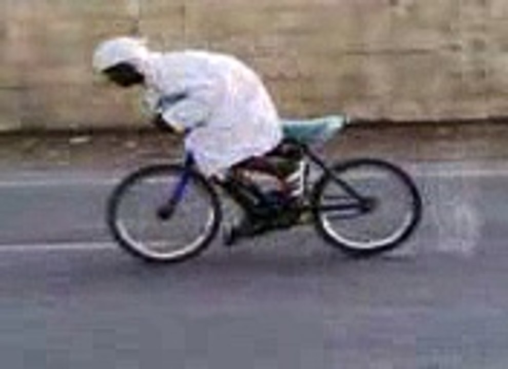 BMX-R bicycling - aged man on kids bicycle