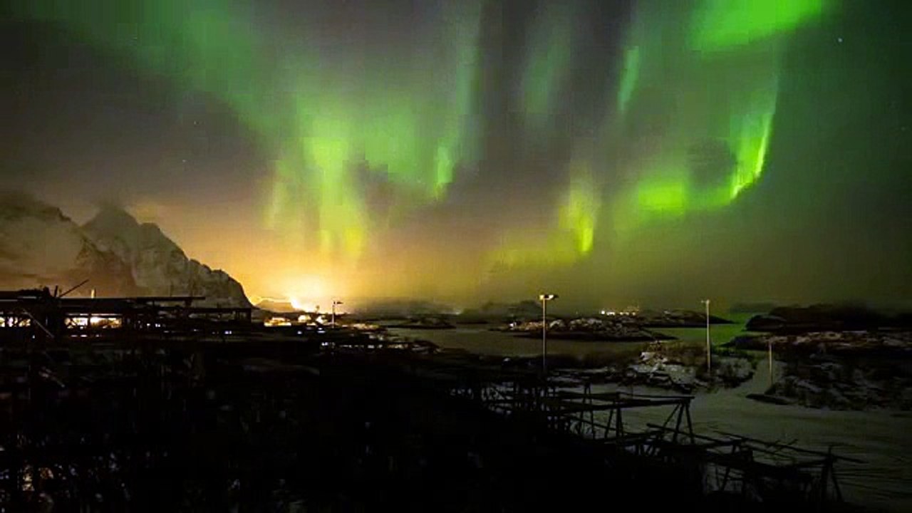 Hunting the Light : The Northern Light in Henningsvær, Lofoten Islands. Aurora Borealis in