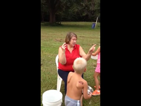 Dog Pitbull attacks woman in Ice Bucket Challenge