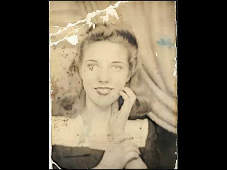 Restoration and colorisation of a damaged photograph