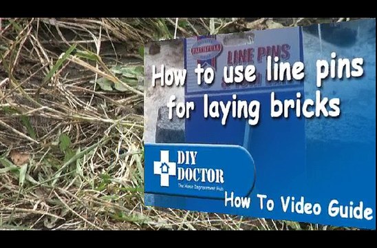 Using line pins for laying bricks