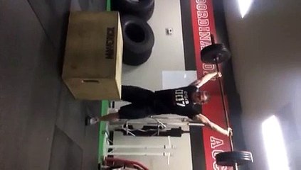 Man Jumps on Box Lifting 135 lb. Weight!