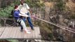 Guts Of Steel   Woman Jumps Off A Cliff Straight Towards A Surging River