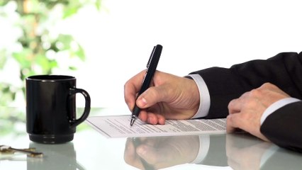 Lawyer filing a contract form