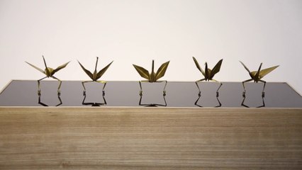 Dancing Paper Machine with Origami folding paper