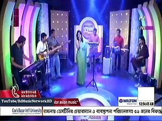 Akhi Alomgir song Shamne Pechone