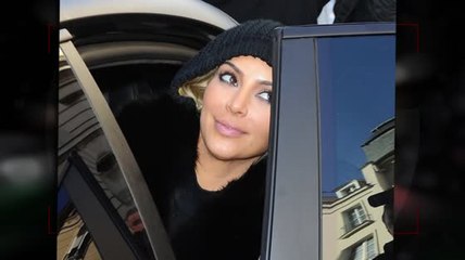 What Is Kim Kardashian Hiding Underneath Her Hat?
