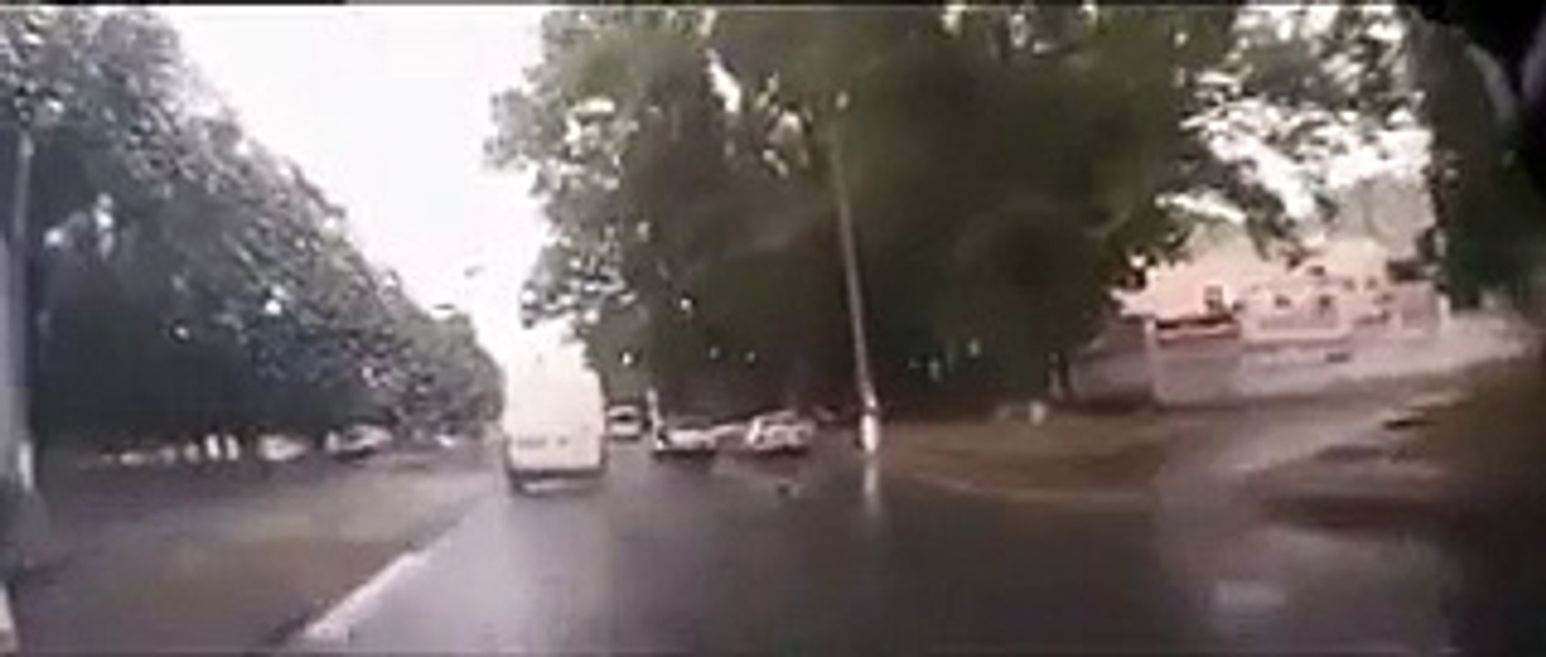 Van Drives Into Open Manhole