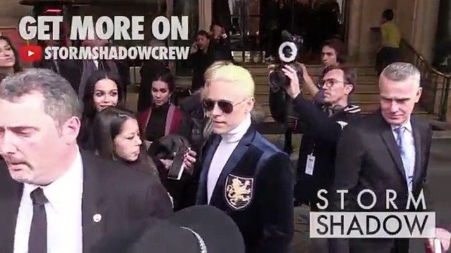 Kim Kardashian giggles as Kanye West makes a grab for her derriere in Paris