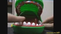 Japanese Roulette Pushing teeth with thumb tacs that hit your finger