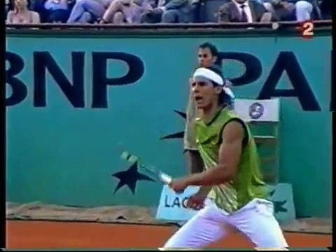Roger Federer hits a magical shot against Rafael Nadal