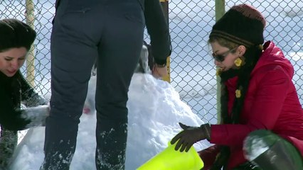 Just north of Tehran, Iranians take part in snowman festival