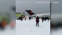 Watch as passengers exit airliner that skidded off of the runway in New York