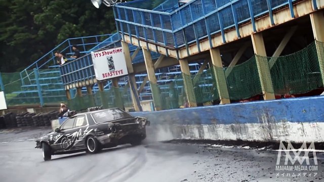 Nissan C33 Laurel grinding the wall at Ebisu circuit Japan drifting