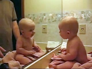 CUTE BABY IN THE MIRROR