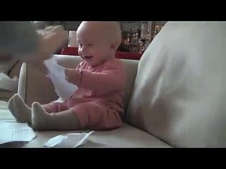 cute baby laughing loudly