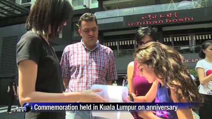 Chinese relatives remember the MH370 missing a year on