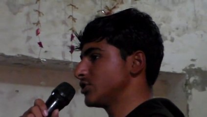 Zeshan Iqbal is addressing his seniors at farewell party of school