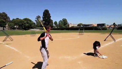Un pro du baseball nous fait une démonstration avec sa batte