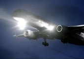 Airliners Illuminate the Night Sky During Takeoffs and Landings