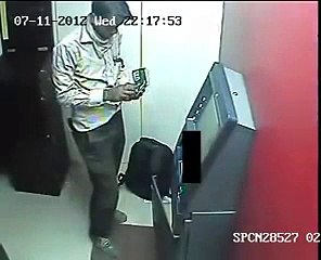 Check what this Guy is doing at ATM Machine.