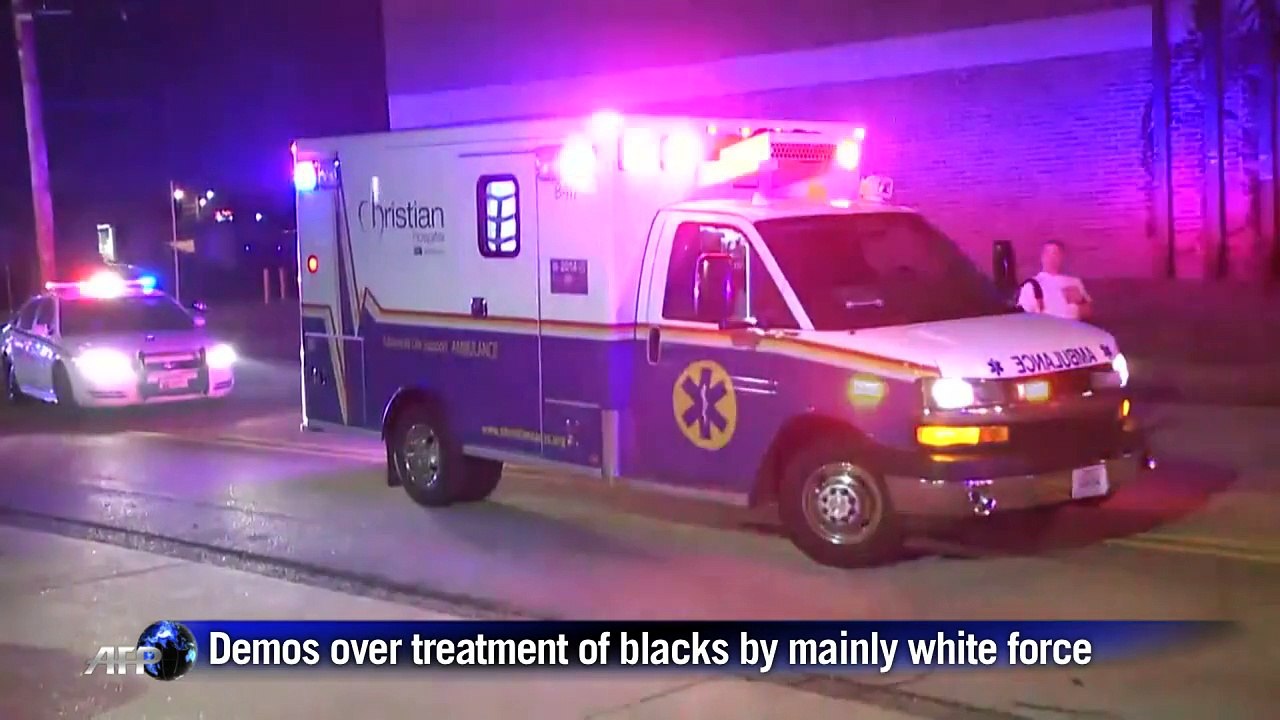 Two US police officers shot in Ferguson amid protests