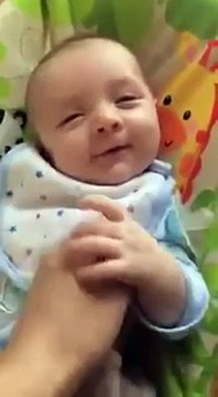 Amazing moment seven-week-old baby says hello