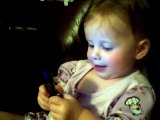 baby talking to dad on phone funny girl