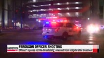 Two officers shot in Ferguson during peaceful rally