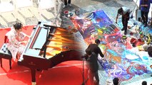 Música i pintura s'uneixen  a la Plaça Reial