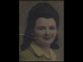 Restoration of a cracked and damaged photograph (c 1950)
