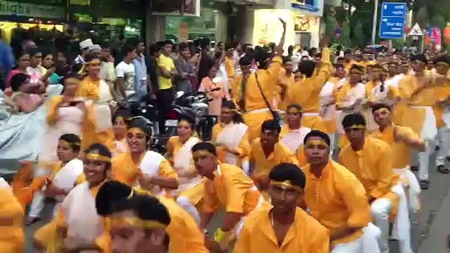 Lezim dance being performed during Ganesh Chaturthi procession