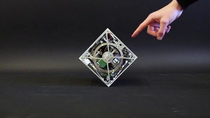 The Cubli: a cube that can jump up, balance, and 'walk'