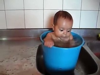 Baby in Tub making Funny Faces